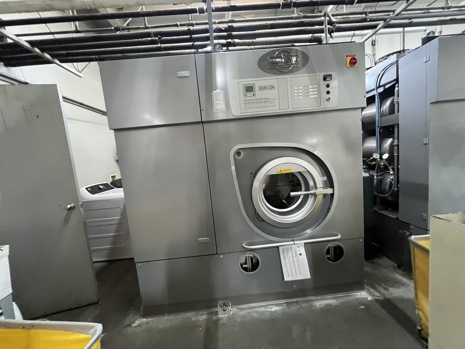 An environmentally conscious dry cleaning machine inside the Dry Clean Super Center plant in Benbrook